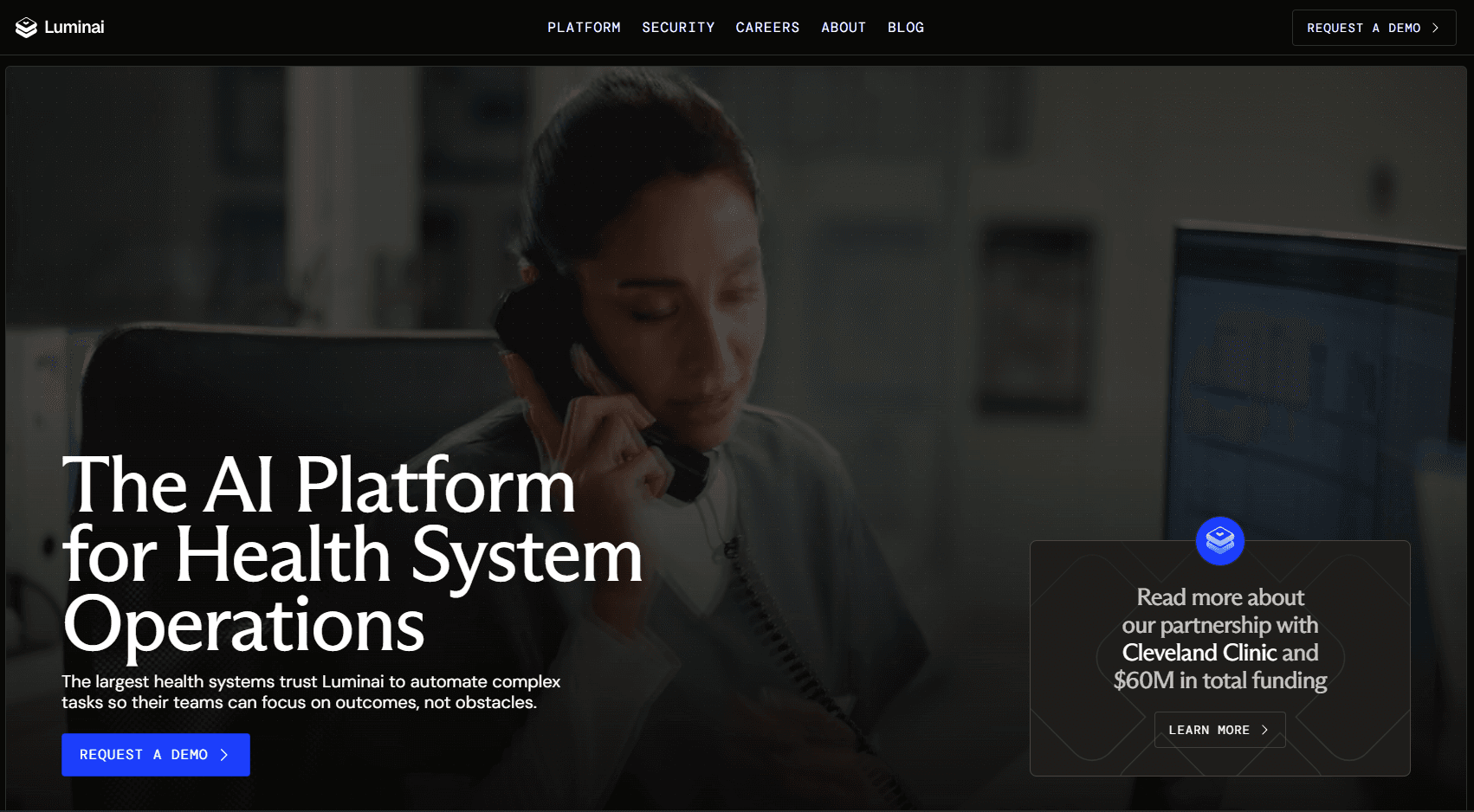 Luminai web sitesi ana sayfası — koyu arka planda sağlık personeli görseli üzerinde The AI Platform for Health System Operations başlığı